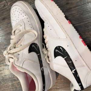 White and Black Sneakers with Pink Accents